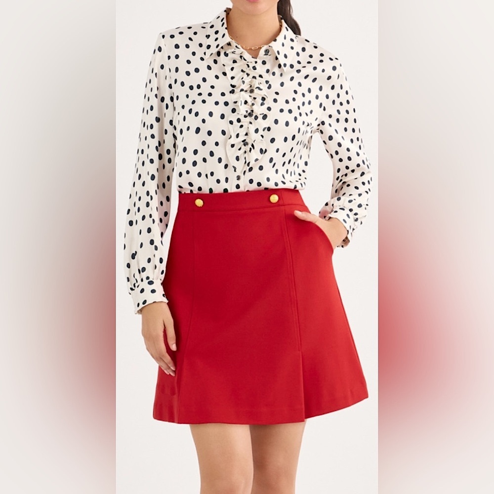 Cabi 2025 Classic Navy & White Polka Dot Long Sleeved Blouse with Ruffle Detail.